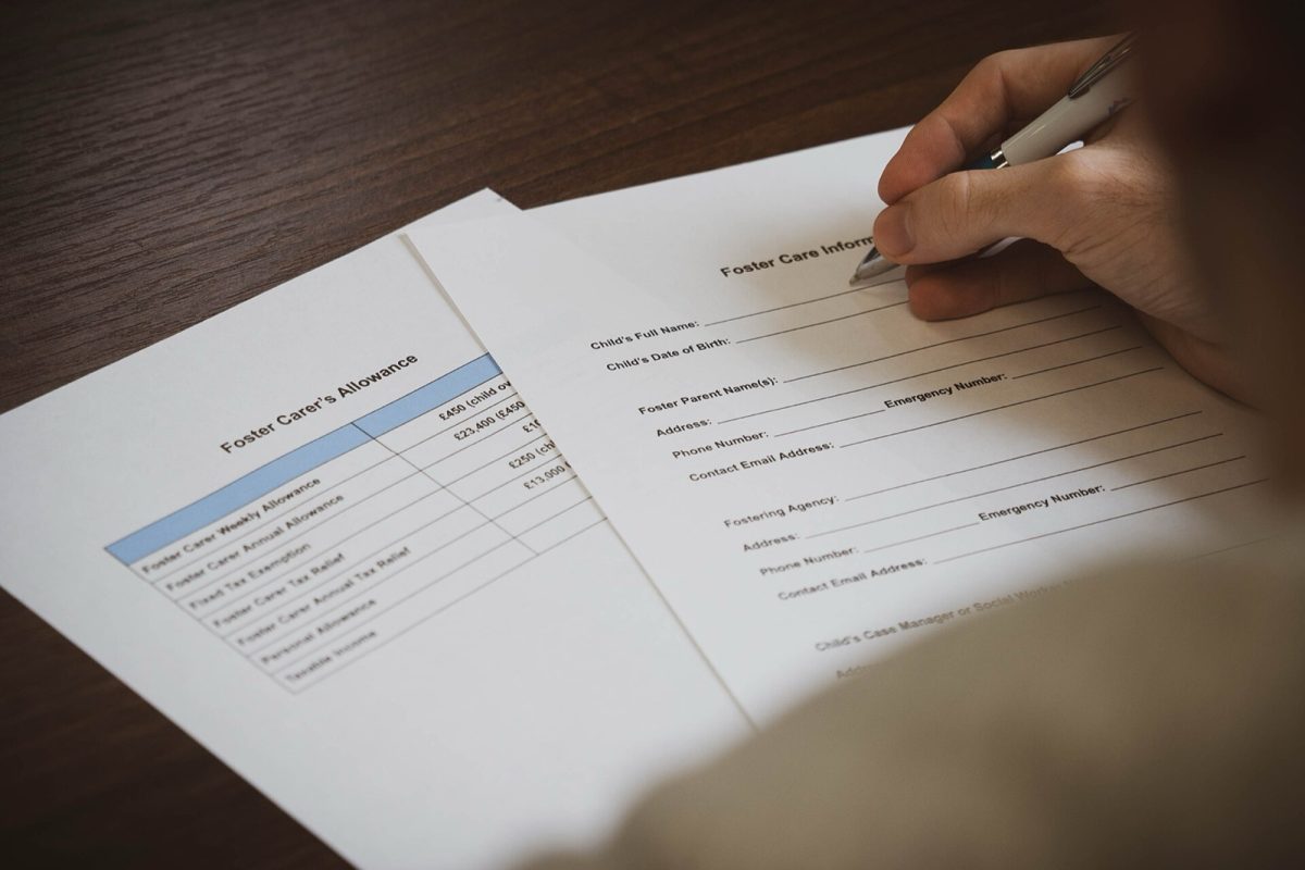 Foster care paperwork (file photo). Georgia's foster care spending on direct services rose $155 million from fiscal 2022 to 2025, state auditors found.