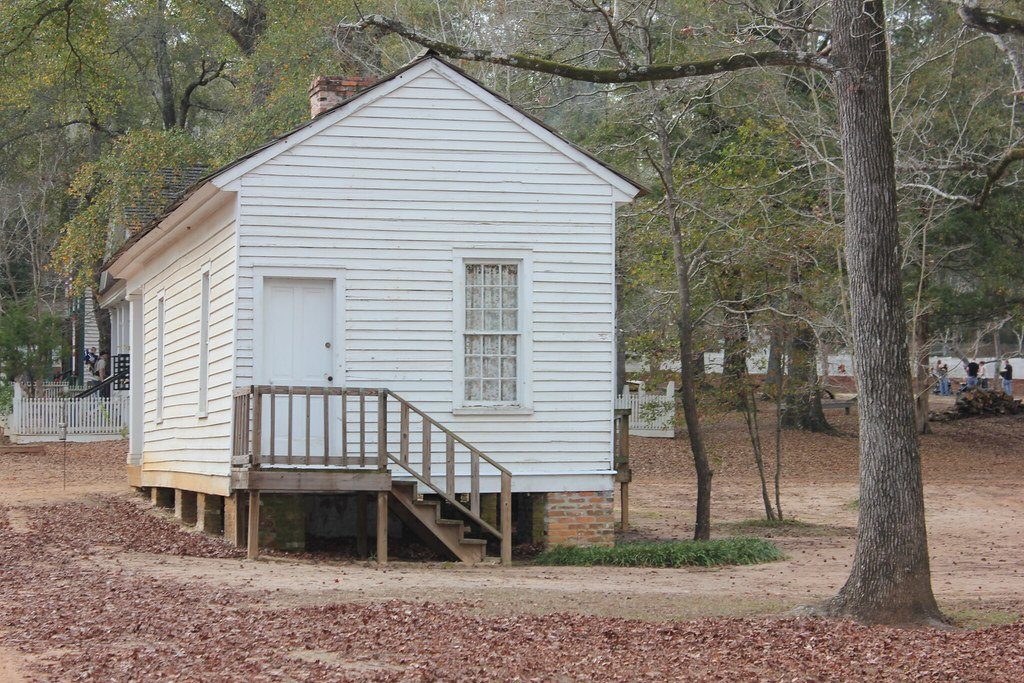 A white frame building at Westville, photographed at the village's former Lumpkin site in 2012.