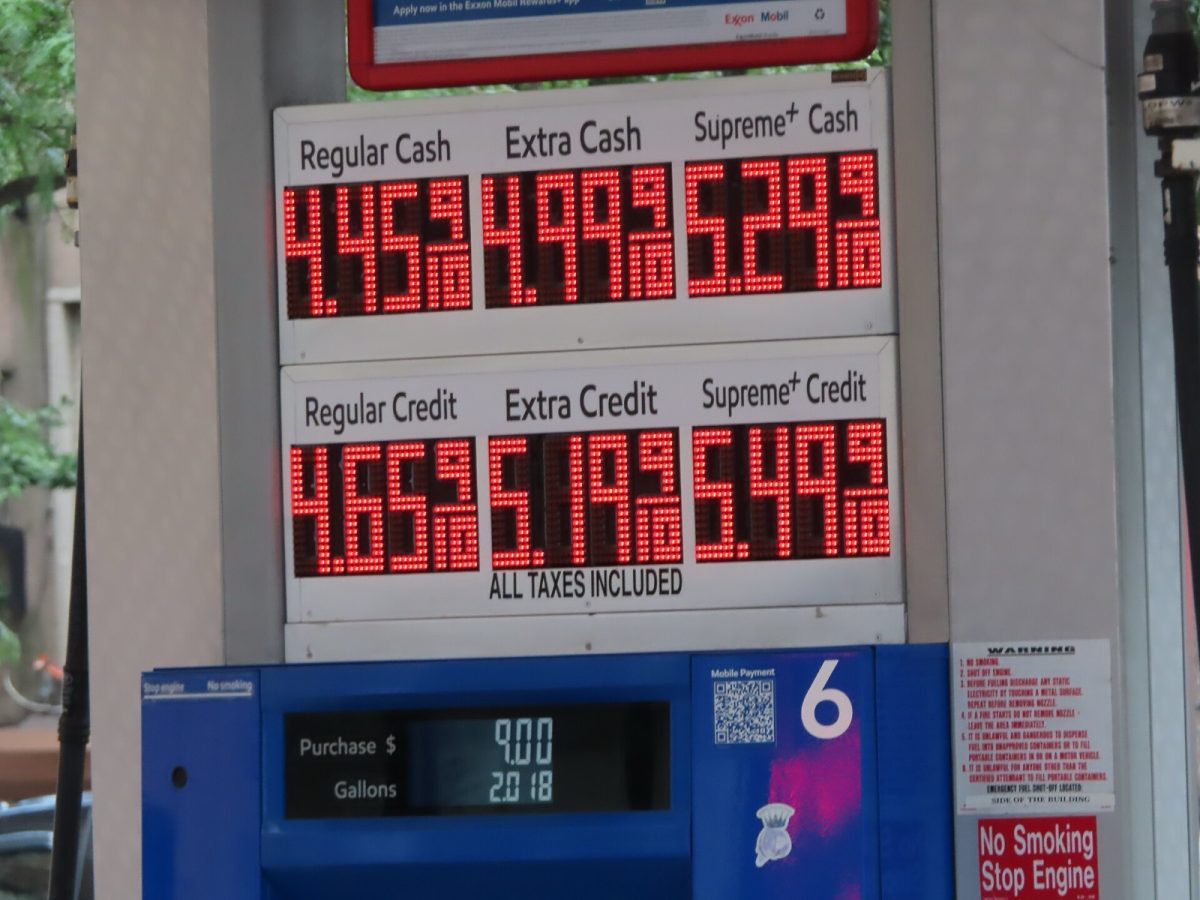 Cash and credit prices on a gas pump (file photo).