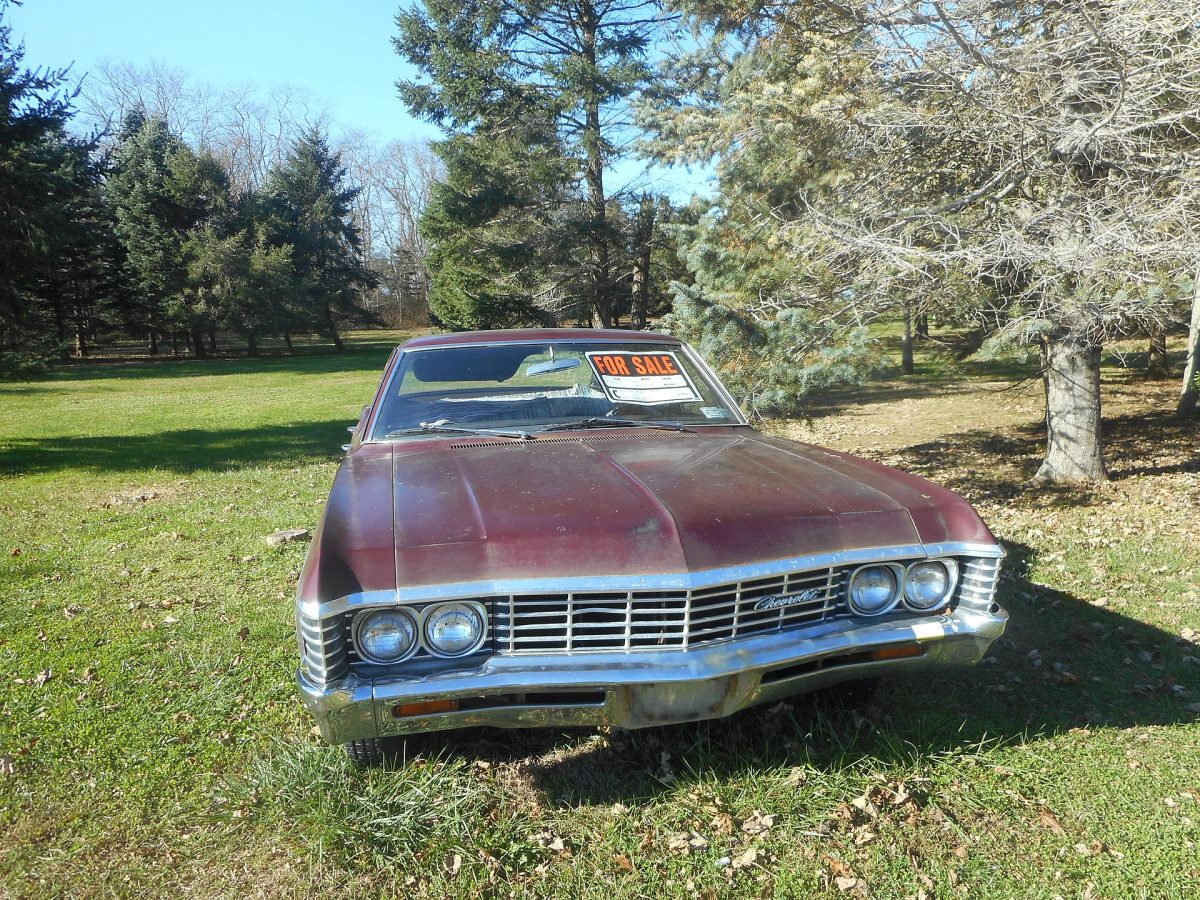 A car with a for-sale sign in the windshield (file photo).